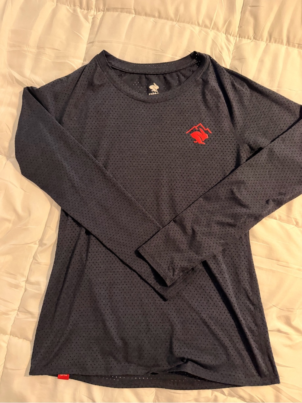 Rabbit Women’s Long-Sleeve Performance Trail Tee in Navy with Red Logo